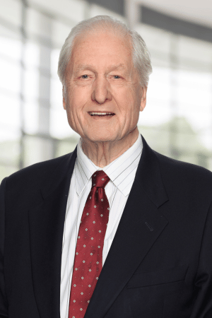 Kumar Murty standing with calculation in the background behind him.